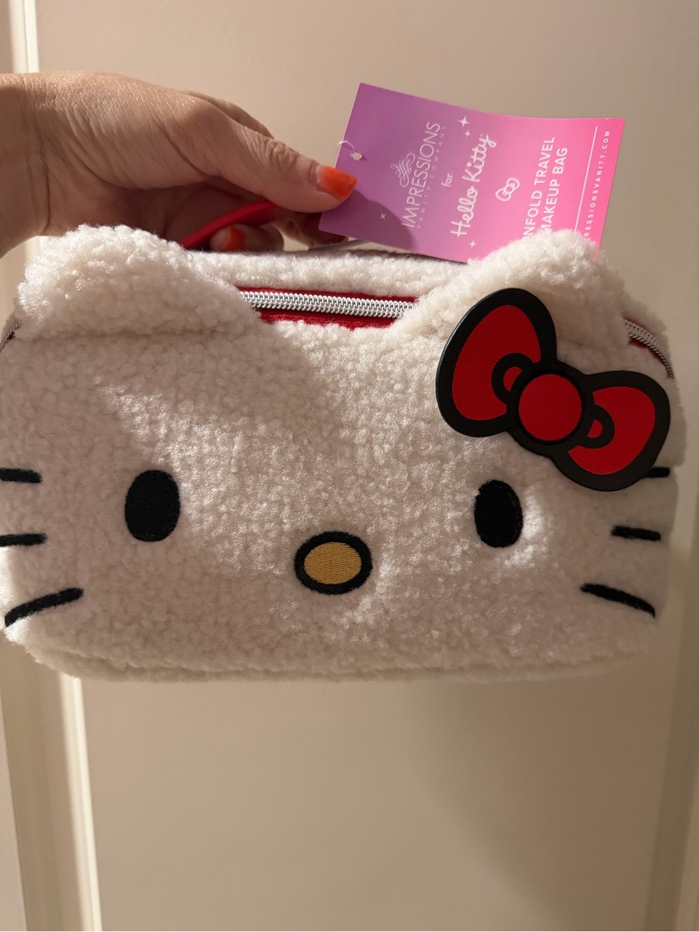 Hello Kitty Plush Travel Pouch in White with Red Bow